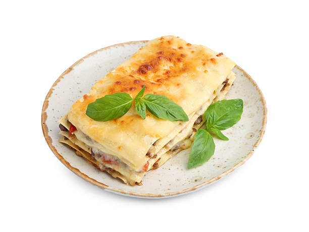 istock Delicious cooked lasagna with basil isolated on white 2235932417