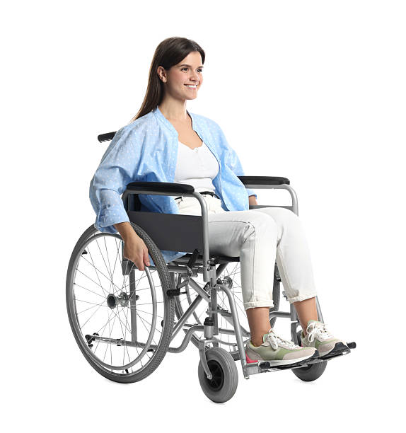 istock Smiling woman in wheelchair on white background 2235933708