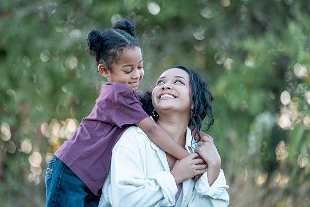 istock Mother and Daughter Sharing a Loving Moment in a Natural Setting 2235936353