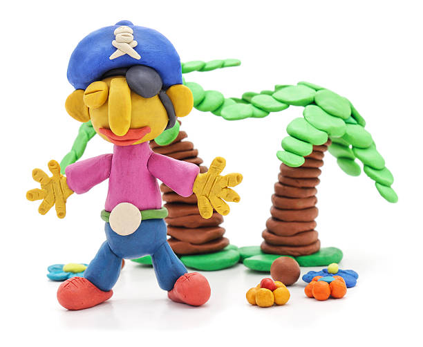 istock Plasticine pirate with palm trees isolated on white background. 2235937693