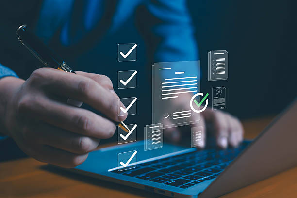 istock Businessman using laptop with digital checklist document icons, symbolizing task management, productivity, online workflow, project planning, successful business strategy organization, efficiency 2235938207
