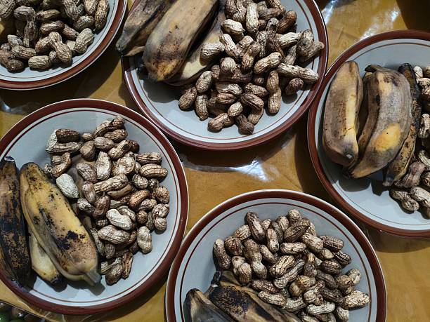Plates of Peanuts and Boiled Bananas. ready to eat