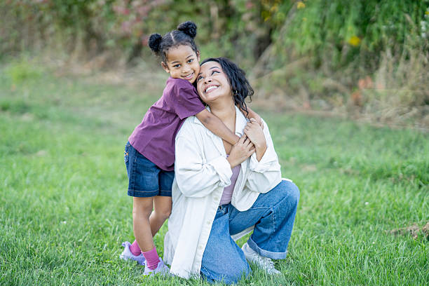 istock Mother and Daughter Enjoying Quality Time Outdoors in Nature 2235941981