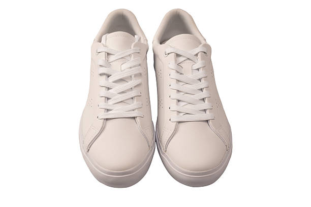 istock White leather sneakers isolated on white background. 2235942669