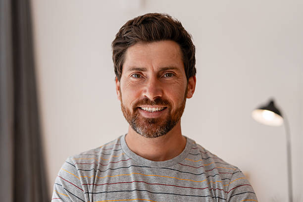 istock Portrait of a smiling man looking at camera 2235945423