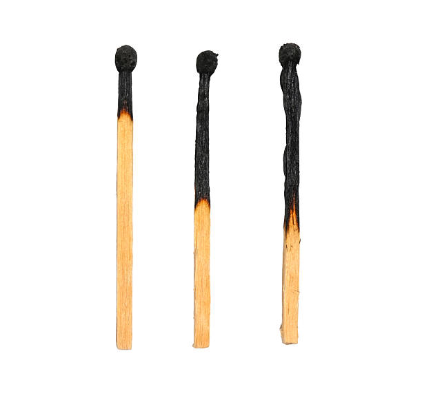 istock Three burned wooden matches isolated on white, clipping path 2235946352