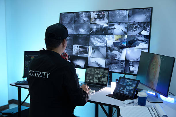 istock Security officers are checking the TV screen of the CCTV system. 2235947044