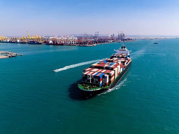 istock shipping cargo logistic, container ship carrying in sea import export goods and distributing products to dealer consumers across Asia pacific and worldwide global business transportation by container ship 2235950580
