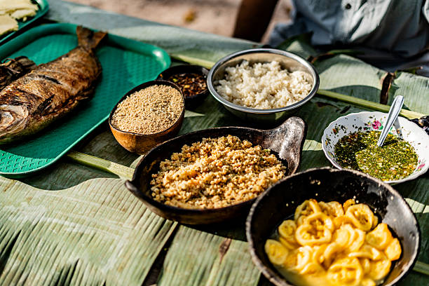 Traditional grilled fish dish from Curripaco indigenous tribe with typical accompaniments