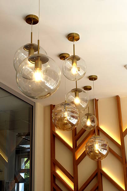 Round glass lamps hang from the ceiling.