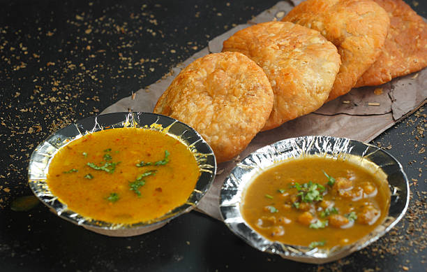 istock Traditional Indian Kachori with Aloo Sabzi and Chole 2235953697
