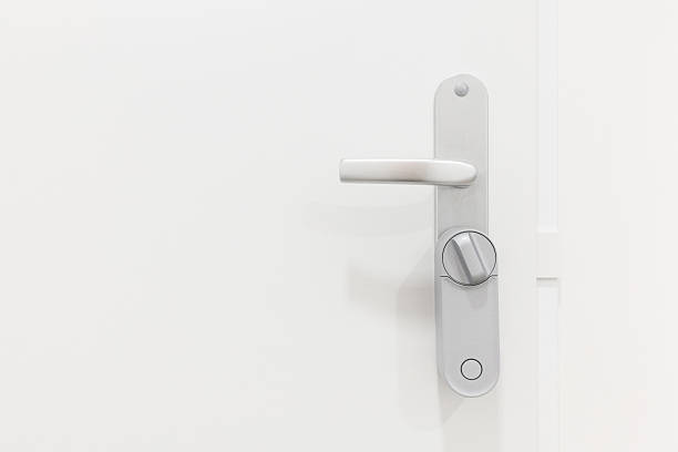 istock Modern smart door handle with integrated lock. Symbol of security, home automation 2235955618