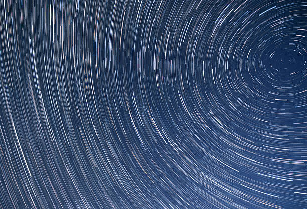 istock Amazing Night Sky With Star Trails 2235958023