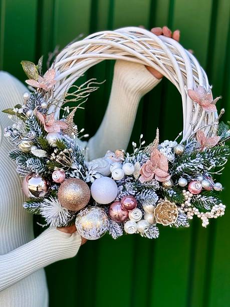 istock festive christmas wreath with pink ornaments 2235960442