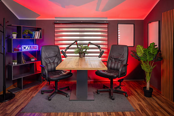 istock Stylish podcast studio interior with expert lighting for digital media production. 2235966317
