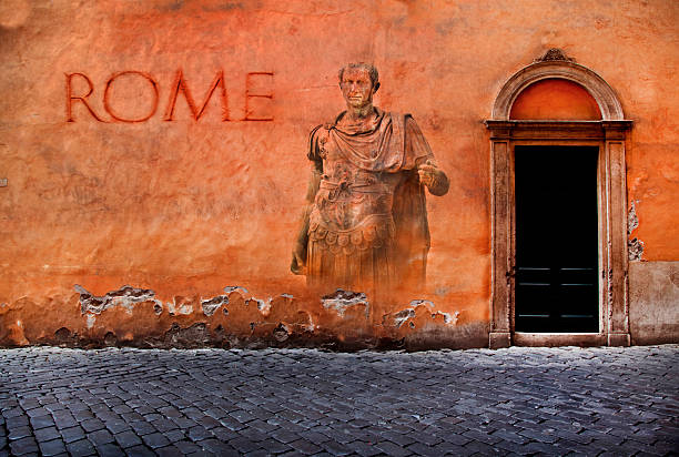 Italy, Rome, wall  with image of Emporer Julius Caesar,  and the word ROME both put there by photographer