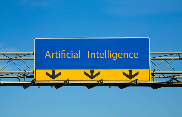 A blue road sign with arrows pointing left, right, and straight ahead, indicating multiple directions for drivers. The clear, bright sky and natural setting enhance the visibility of the sign.