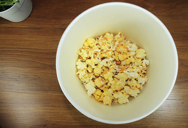 istock delicious salty popcorn  in a white bucket packaging 2235967958