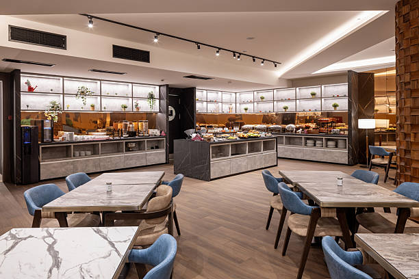istock Interior of a large modern hotel restaurant with buffet table 2235968583