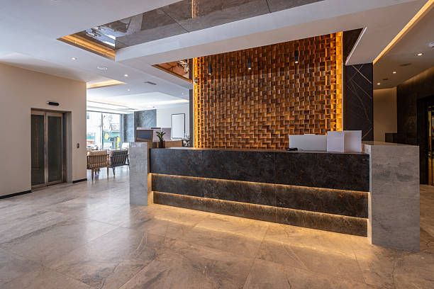 istock Modern hotel reception with wooden wall 2235968769