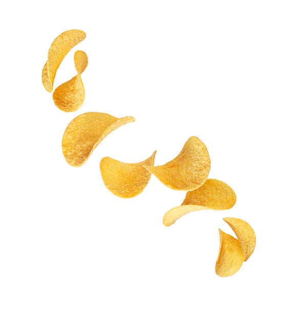 istock Delicious potato chips floating in the air on white background 2235972320