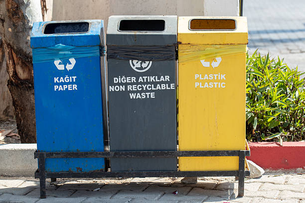 istock Three Recycling Bins for Paper, Waste and Plastic 2235973223