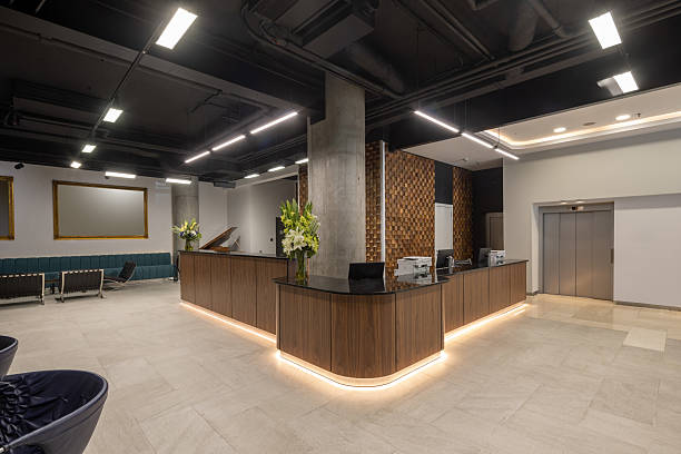 istock Modern hotel reception interior with decorative wooden wall 2235973818
