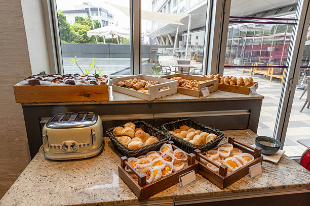 istock Selection of breads and pies on a buffet table for hotel breakfast 2235976489
