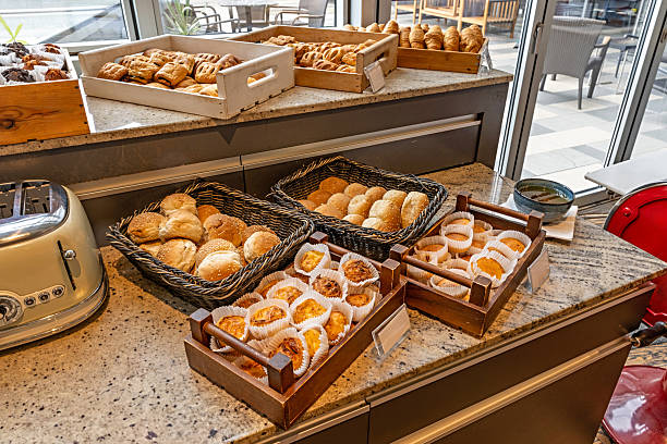 istock Breakfast buffet table featuring a selection of breads and pies 2235976789