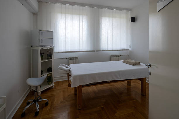 istock Massage therapy room with two treatment tables 2235982531