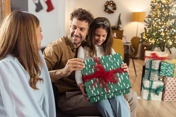 istock Family sharing gifts during Christmas 2235982559