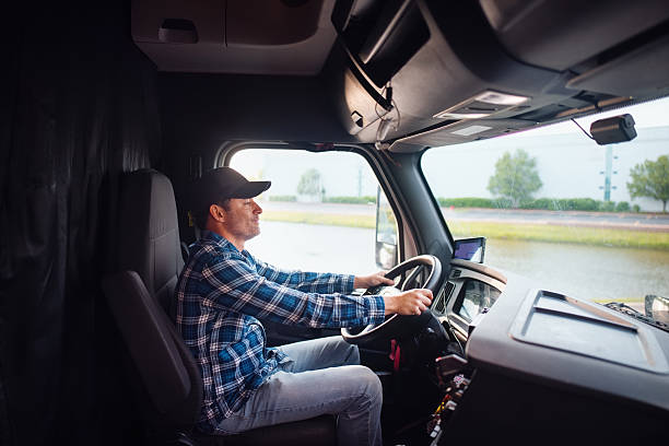 istock Truck Driver Steering a Vehicle on a Scenic Roadway 2235983113