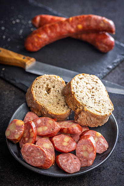 istock Sliced smoked sausage on plate 2235984977