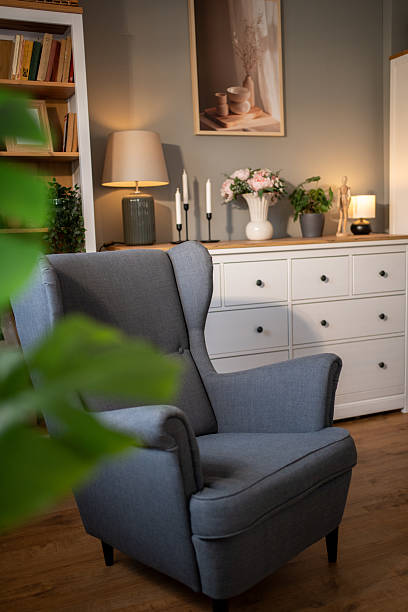 istock Comfortable wingback chair in a modern living room setting 2235988678