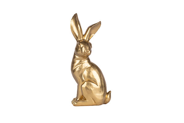 istock Adorable cute gold easter bunny tabletop figurine 2235989487