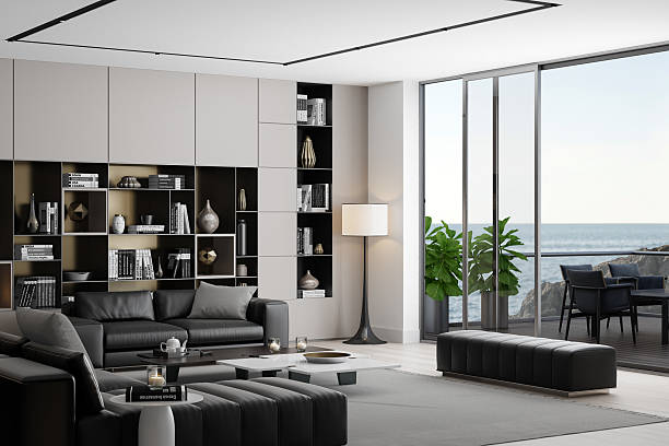istock Elegant Living Room with Black Leather Sofas and Neutral-Toned Decor 2235991129