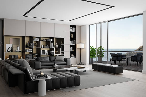 istock Elegant Living Room with Black Leather Sofas and Neutral-Toned Decor 2235991196