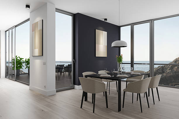 istock Oceanview Dining Room with Black Table and Beige Chairs in Modern Apartment 2235991210