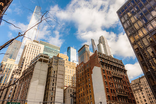 istock Low-Angle View of Manhattan Skyscrapers With Clear Blue Sky 2235993081