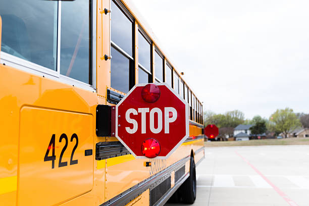 School bus outdoors close stop sign-up