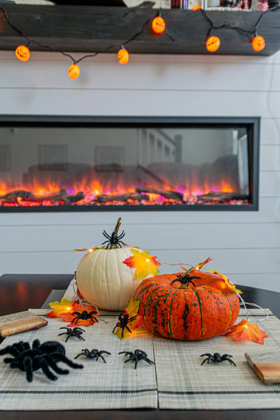 istock Autumn Halloween Pumpkins with Spider Decorations Indoors 2236001090