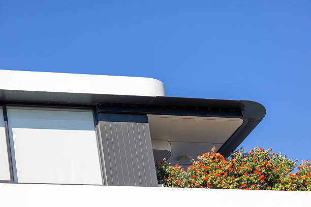 istock Closeup modern apartment building in sunlight, top part, background with copy space 2236008299
