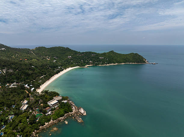 istock Tropical bay with pristine beach and emerald waters. Ko Pha Ngan, Thailand. 2236008561