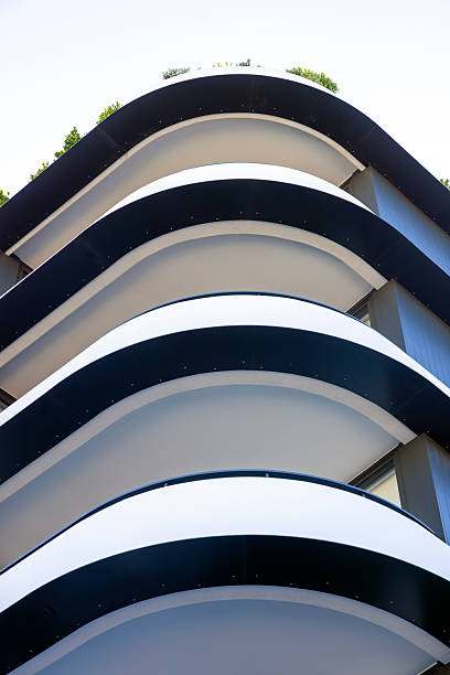 istock Closeup modern apartment building in sunlight, top part, background with copy space 2236009465