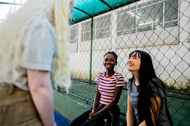 istock Student girl talking and relaxing on the school campus 2236009926