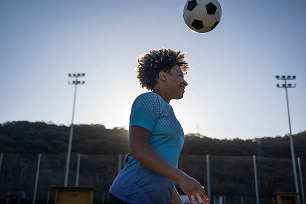 istock Coach playing soccer in the late afternoon 2236011724
