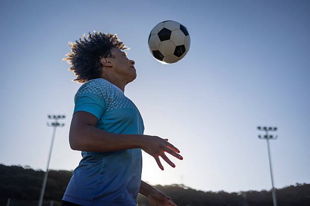 istock Coach playing soccer in the late afternoon 2236011734