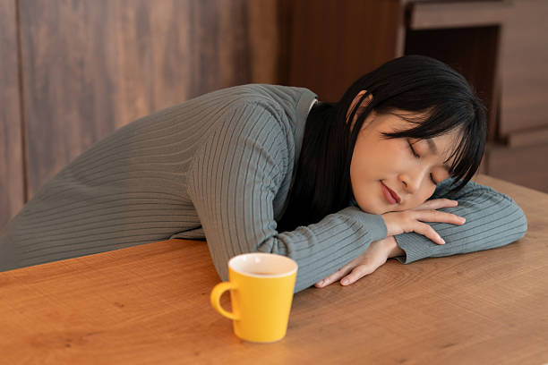 istock attractive asian woman who gets tired 2236015277
