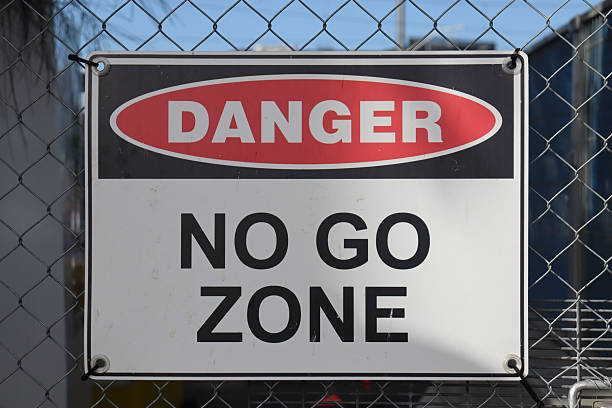 istock Danger no go sign on wire fence 2236017687