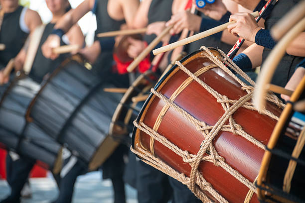 istock Taiko drummers preform at an outdoor stage 2236017700